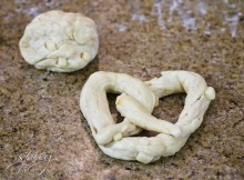 How to Twist a Soft Pretzel | ASpicyPerspective.com #SoftPretzels #CaramelApples #FallRecipes