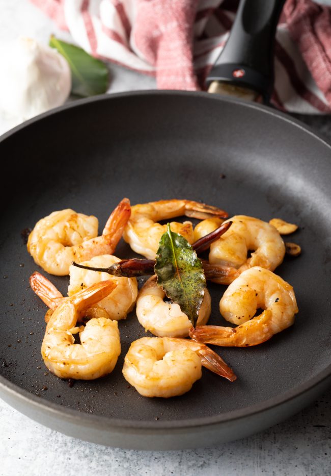 Gambas Al Ajillo Recipe (Spanish Garlic Shrimp)
Cook the seafood in a hot pan to saute it to perfection 
