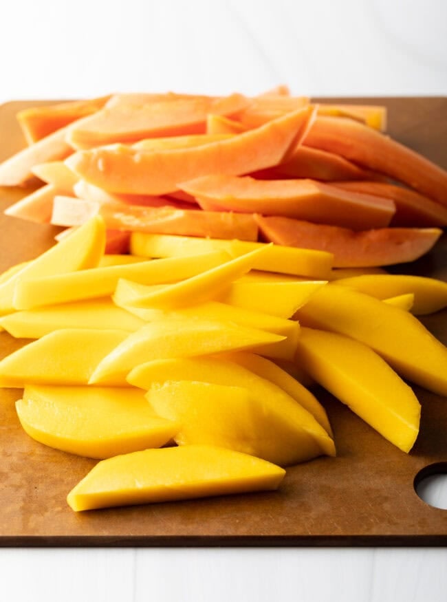 Sliced mango and papaya.