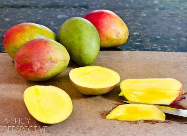 How to Cut a Mango - Pit | ASpicyPerspective.com #howto #cookingtips #mango