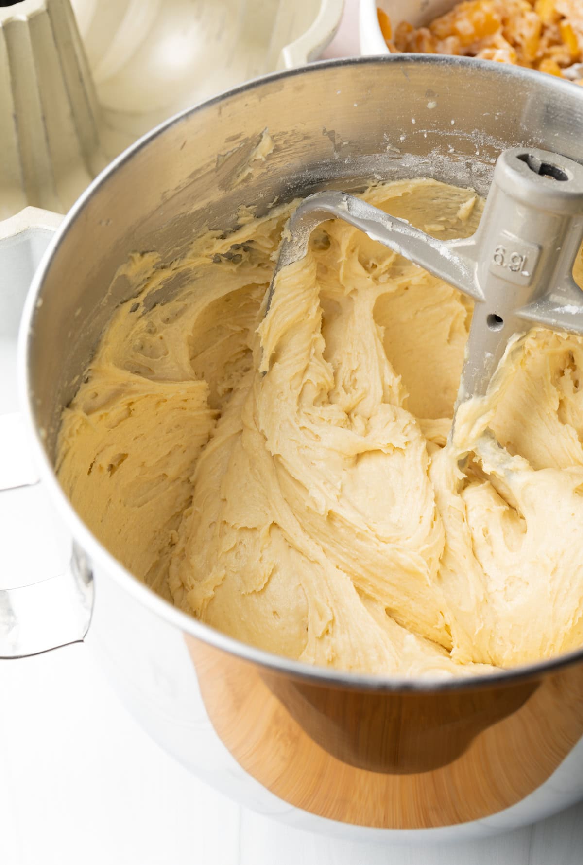 Batter being mixed in a bowl.