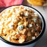 A bowl filled with an easy buffalo chicken salad recipe made with rotisserie chicken.