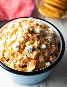 A bowl filled with an easy buffalo chicken salad recipe made with rotisserie chicken.