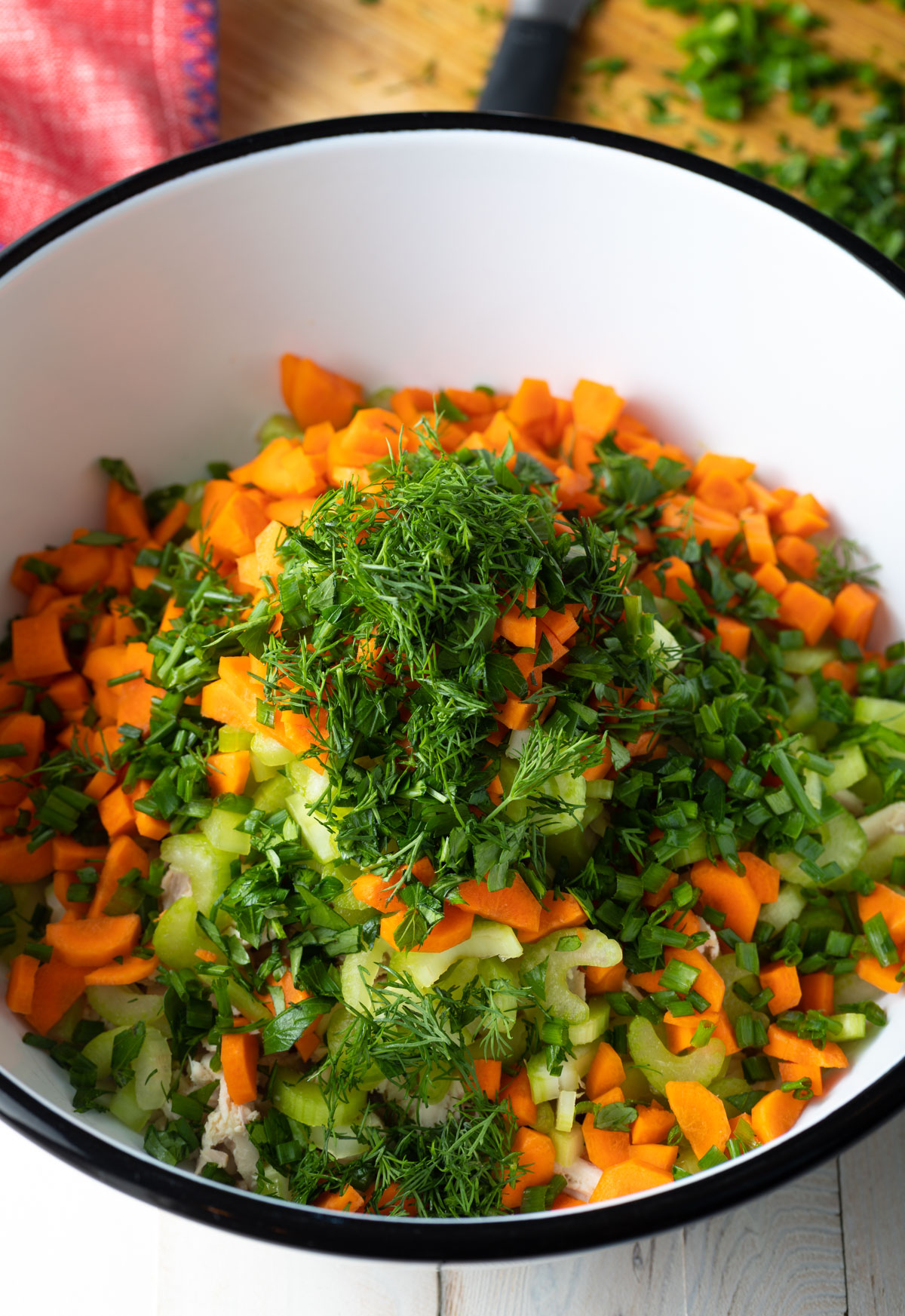 bowl of chopped veggies and herbs