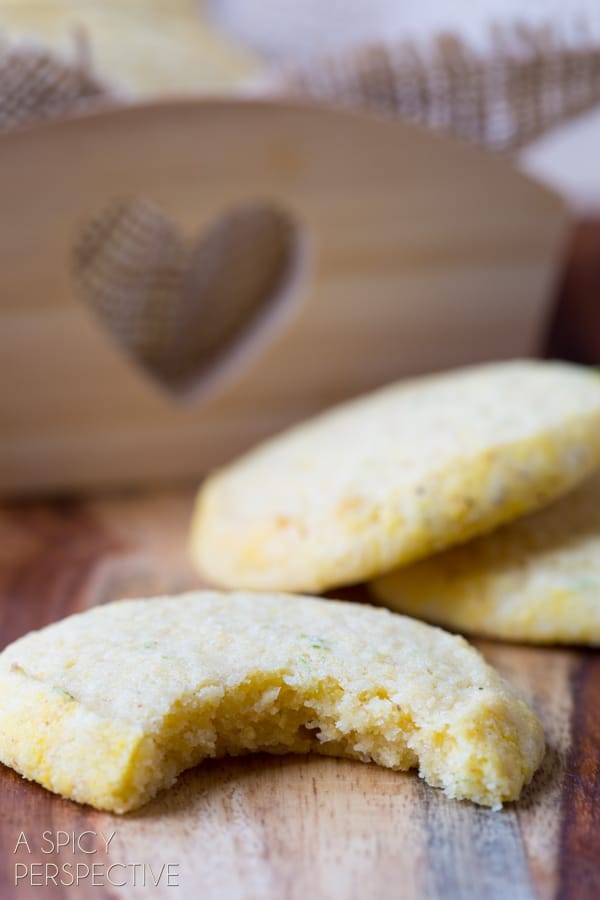 closeup of cornmeal cookie with a bite removed.