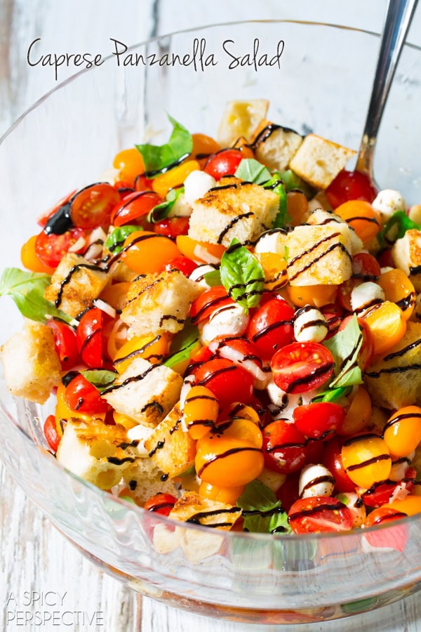 Caprese Panzanella Salad Recipe in glass bowl the balsamic glaze over the top