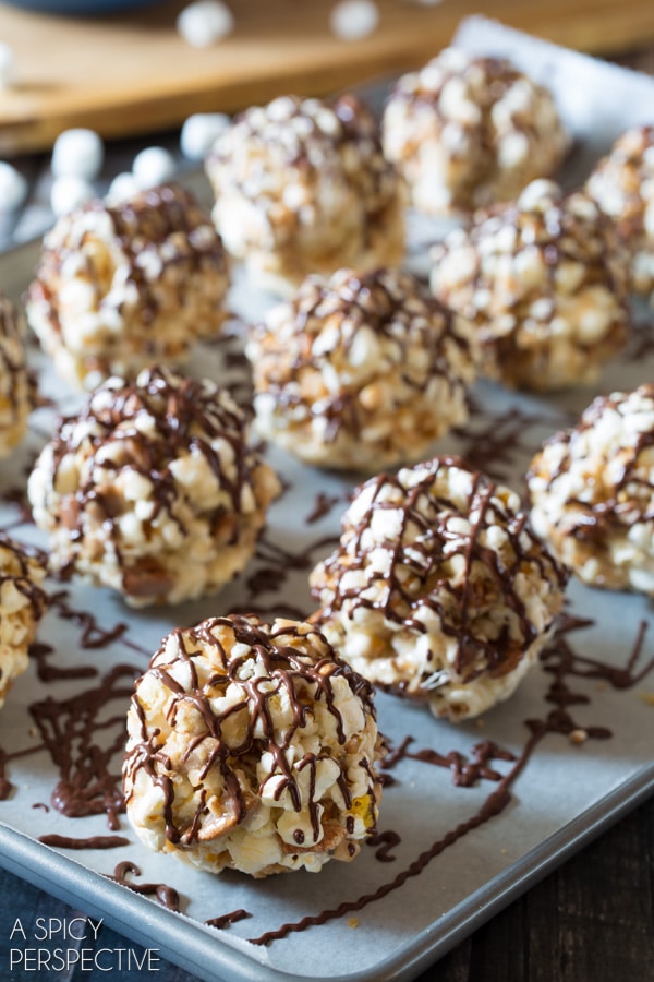 Best Ever Toffee Pecan Popcorn Balls with Chocolate Drizzle #popcorn #holidays