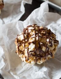 Toffee Pecan Popcorn Balls with Chocolate Drizzle