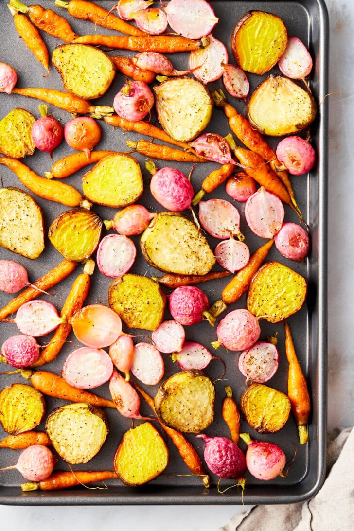 Roasted vegetables on a  sheet pan 