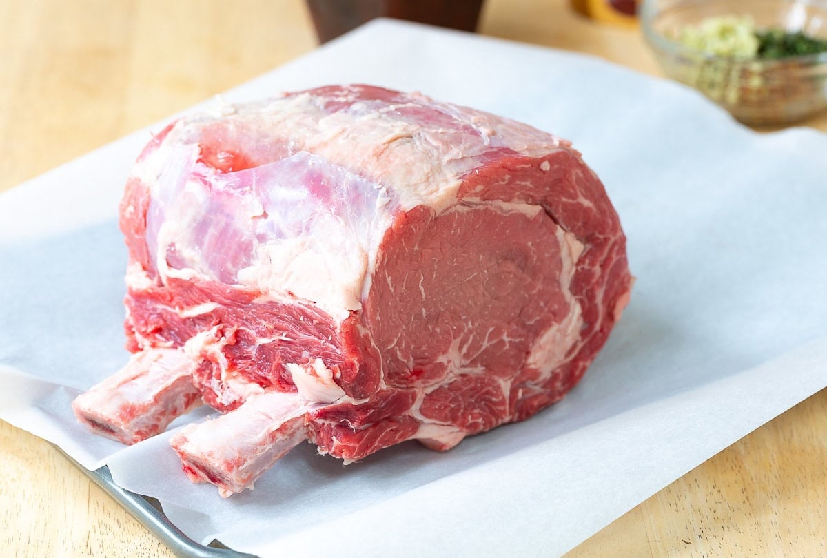 Raw roast on a baking sheet. 