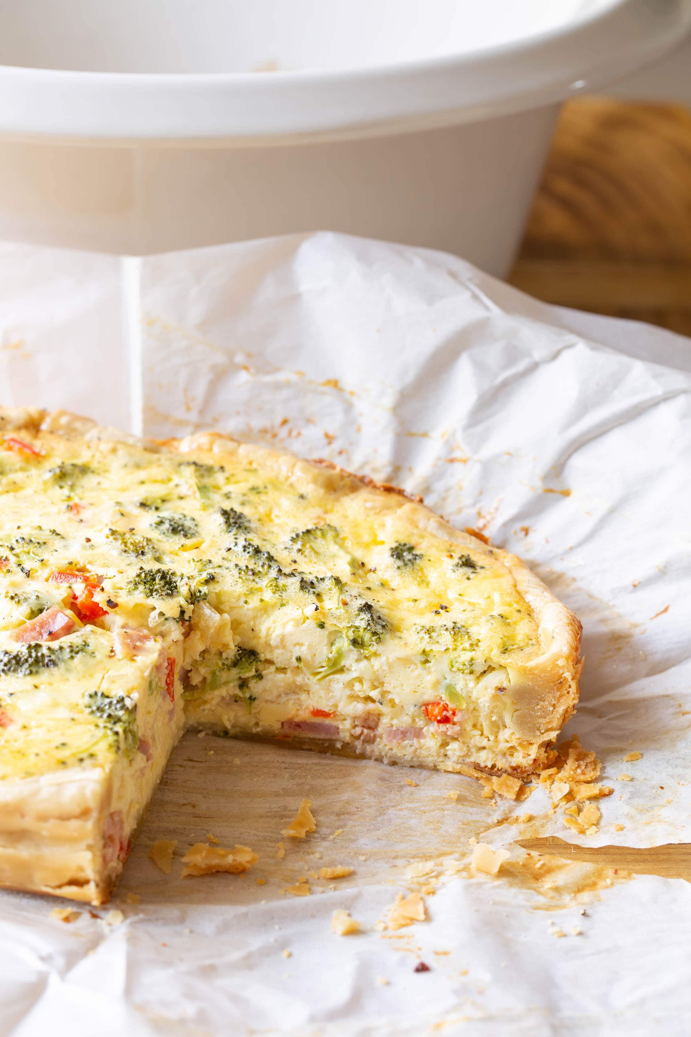 Quiche with slice removed. 