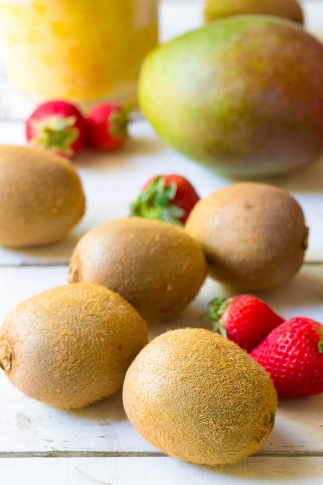 Making Easy Fruit Salad in Kiwi Cups on ASpicyPerspective.com 