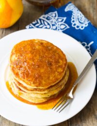 Cornmeal Pancakes with Orange Syrup on ASpicyPerspective.com #breakfast #pancakes
