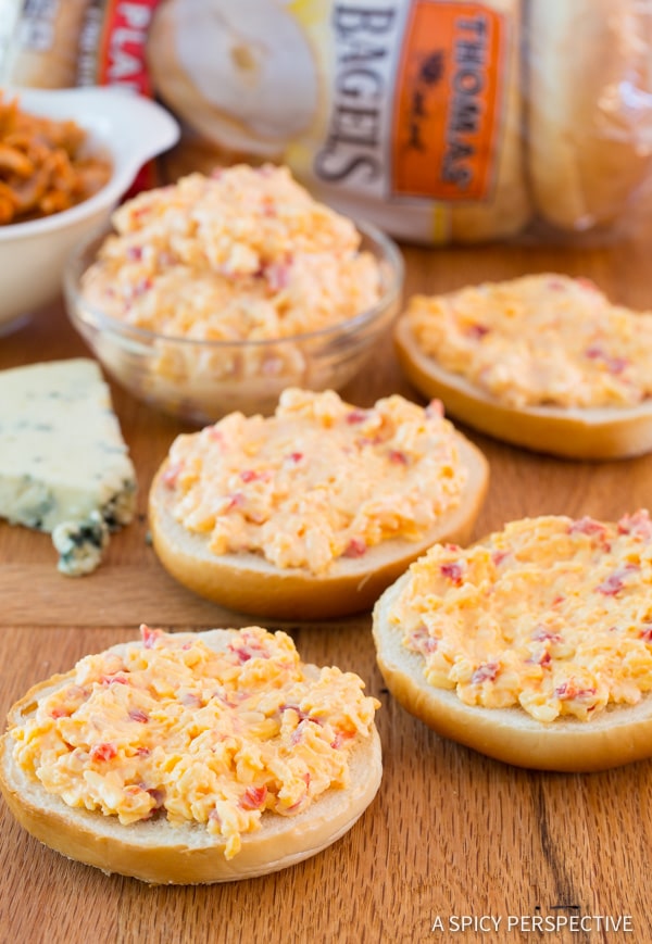 Making Amazing Buffalo Chicken Pimento Cheese Pizza Bagels on ASpicyPerspective.com. 7-Ingredients, Loads of Flavor!