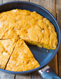 Skillet Pumpkin Blondie Recipe on ASpicyPerspective.com - Buttery and tender with a strong pumpkin spice flavor! #InLove