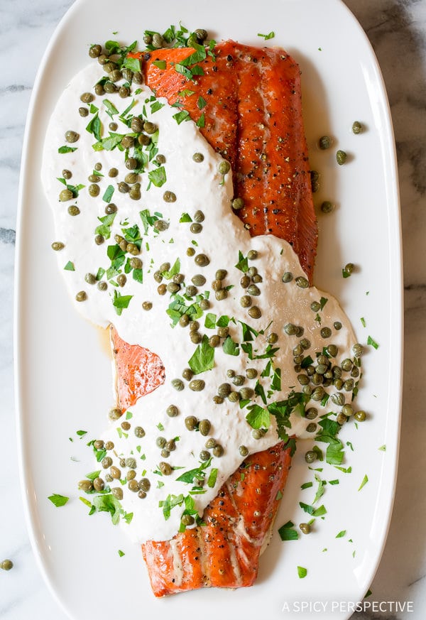 Crazy over this 10-Ingredient Smoky Baked Salmon Recipe with Creamy Horseradish Sauce on ASpicyPerspective.com #holiday