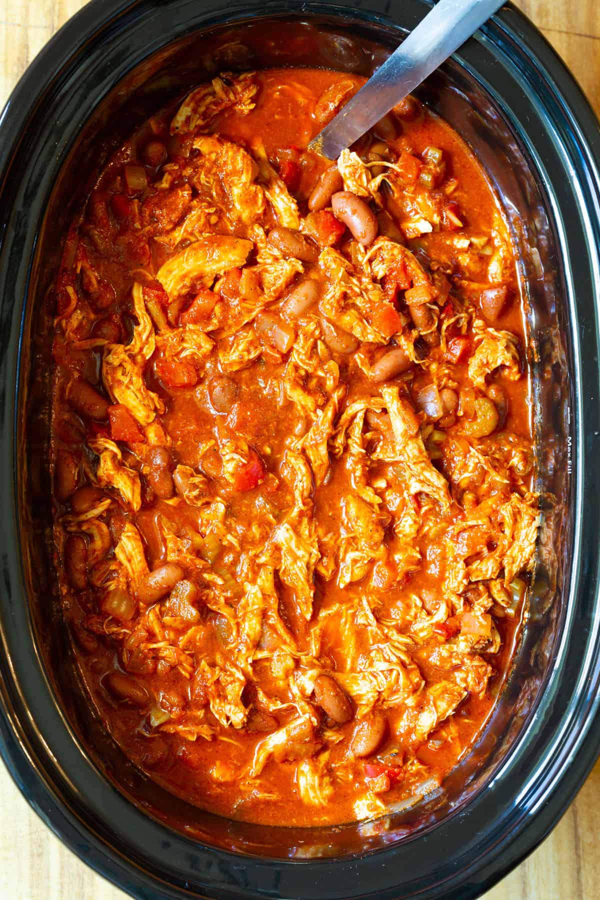 slow cooker red pepper chili in crockpot with chicken