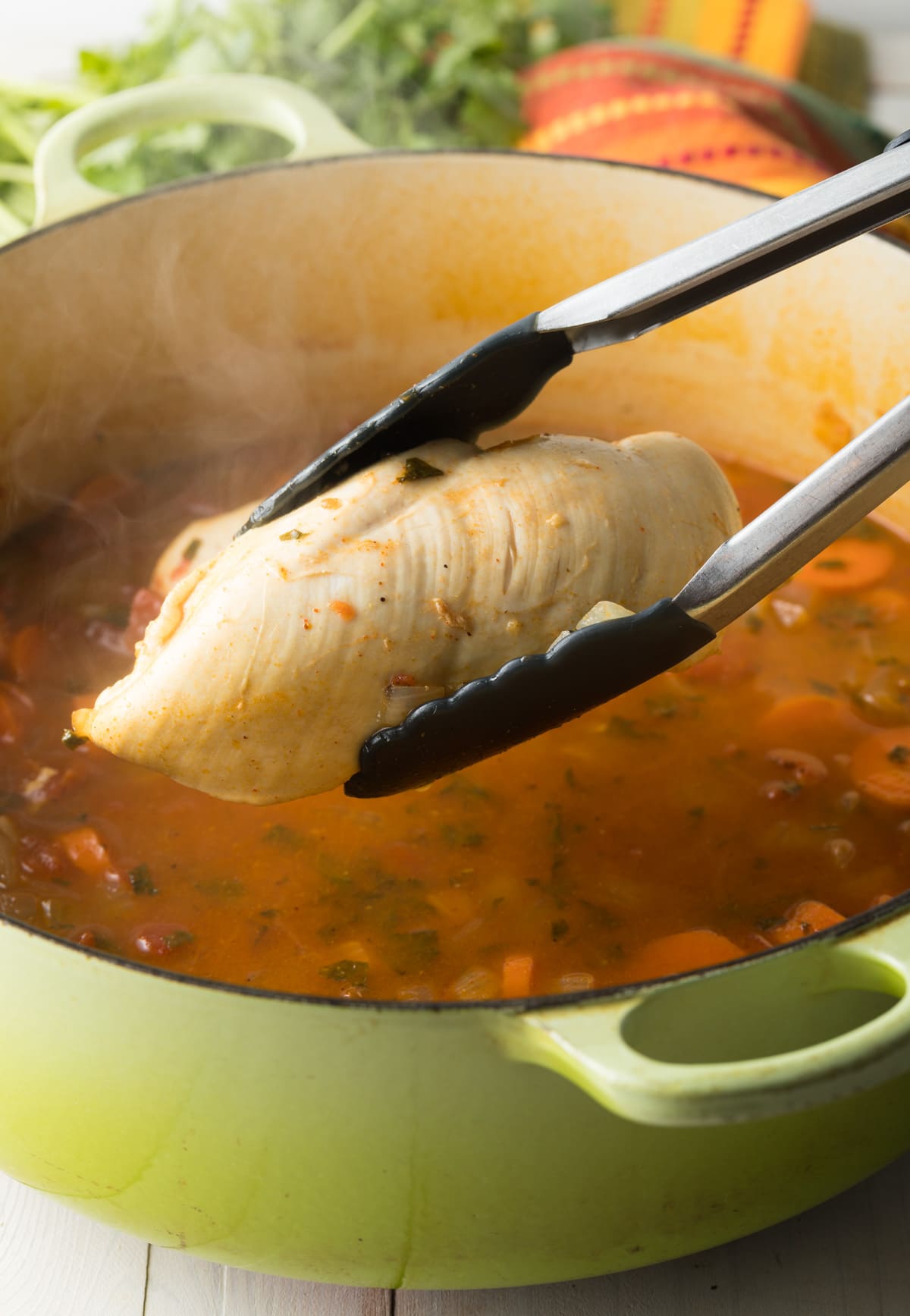 Making Easy Tortilla Soup - shred cooked chicken