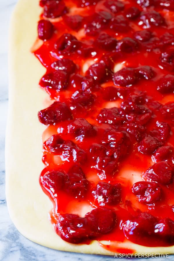 Making Easy Strawberry Sweet Rolls Recipe | ASpicyPerspective.com