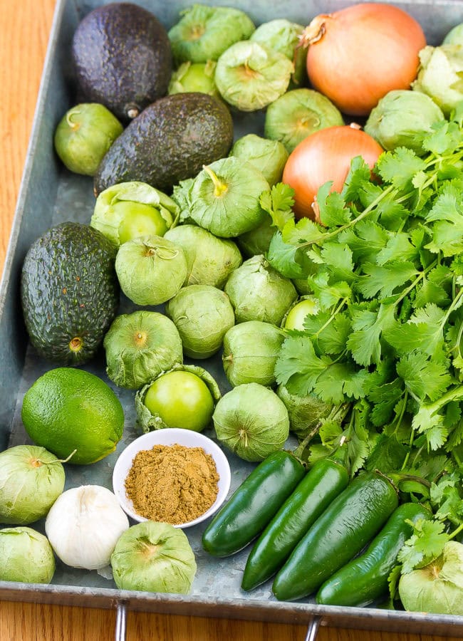 Ingredients for salsa verde all laid out on a platter.
