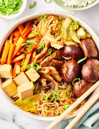 Pork Sukiyaki in a bowl with chopsticks