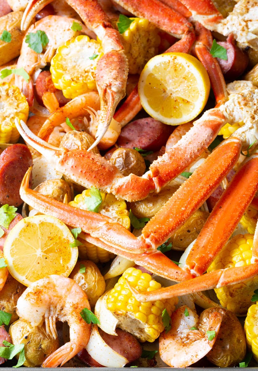 Crab, shrimp corn, potatoes and sausage all piled on a pan.