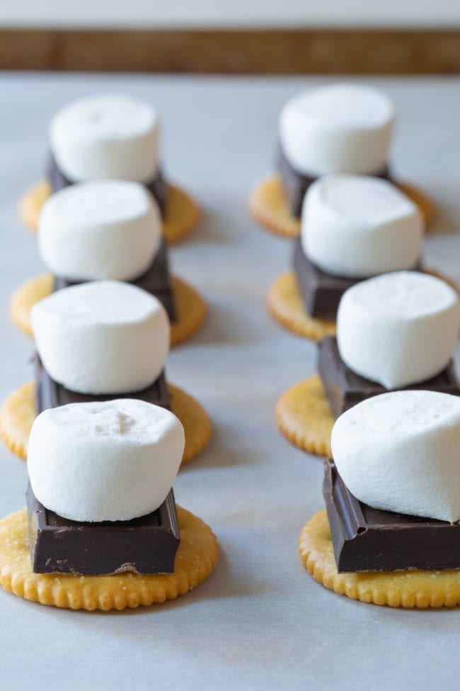 Ritz cracker s'mores with dark chocolate and marshmallows.