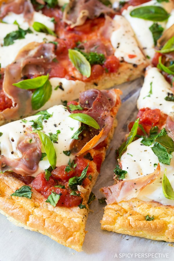 Low carb cloud bread pizza sliced into pieces. 