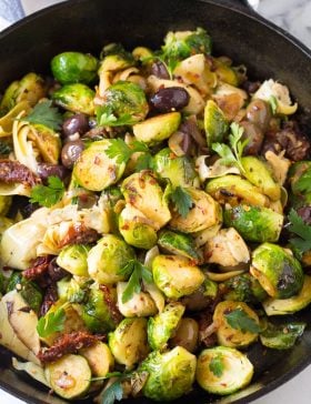 Braised Brussels Sprouts with Sun-Dried Tomatoes, Artichokes, and Olives Recipe
