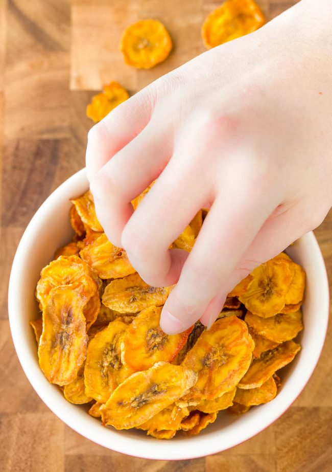 Grab a handful of chips to snack on
