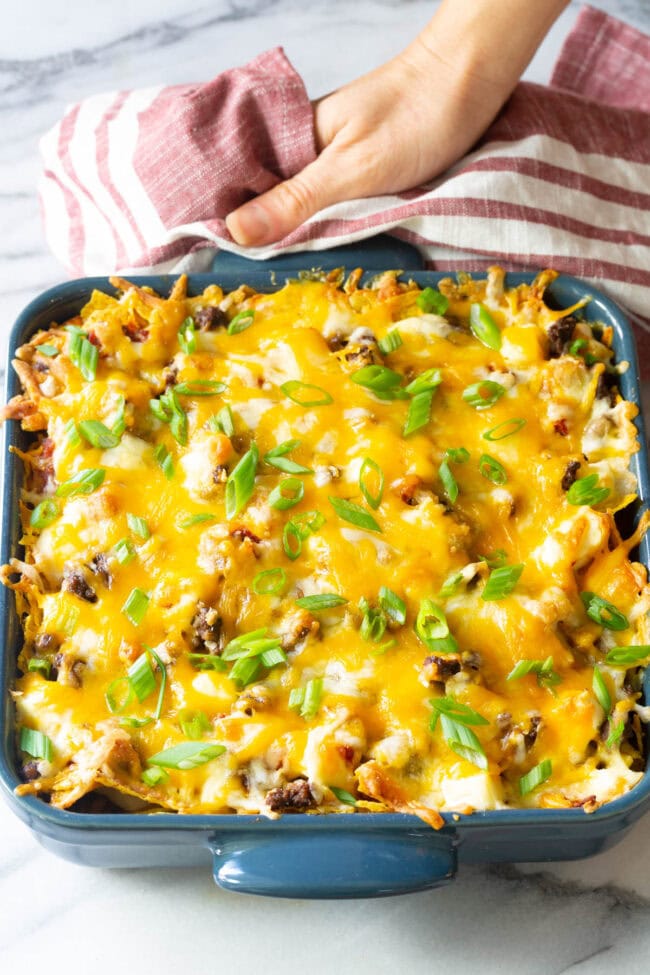 Baked cool ranch dorito casserole in a baking dish.