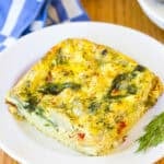 Greek Omelette Casserole recipe - cut and placed on white plate