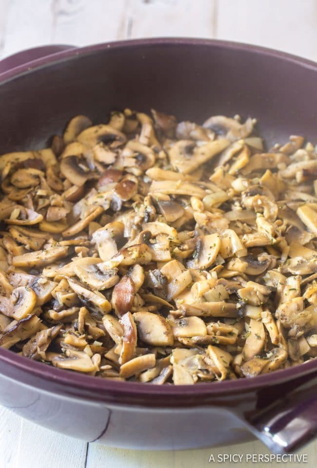 Sauteed mushrooms in a pan.