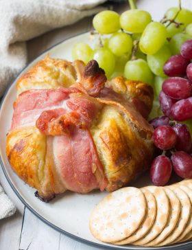 Bacon Wrapped Baked Brie in Puff Pastry Recipe #ASpicyPerspective #bakedbrie #holidays #christmas