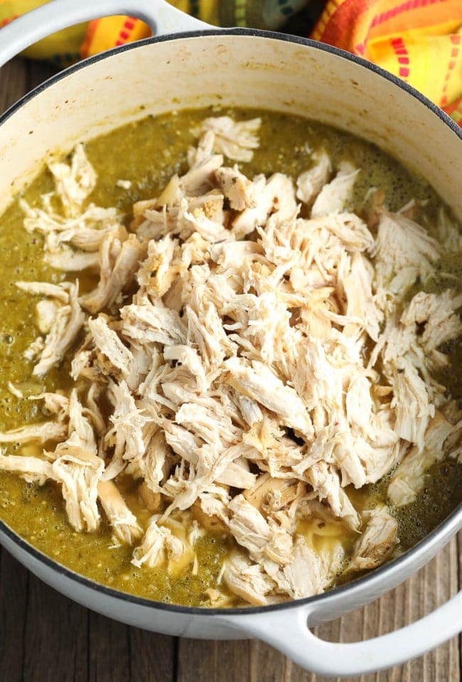 Shredded chicken added to pot. 