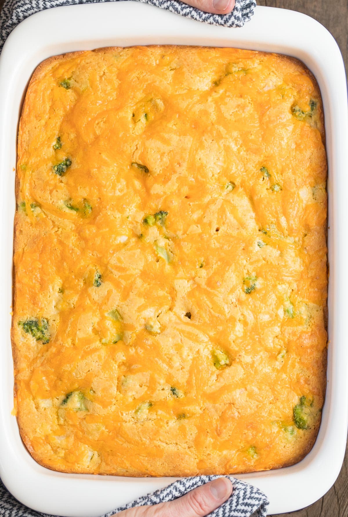 Top down view of freshly baked broccoli cornbread.