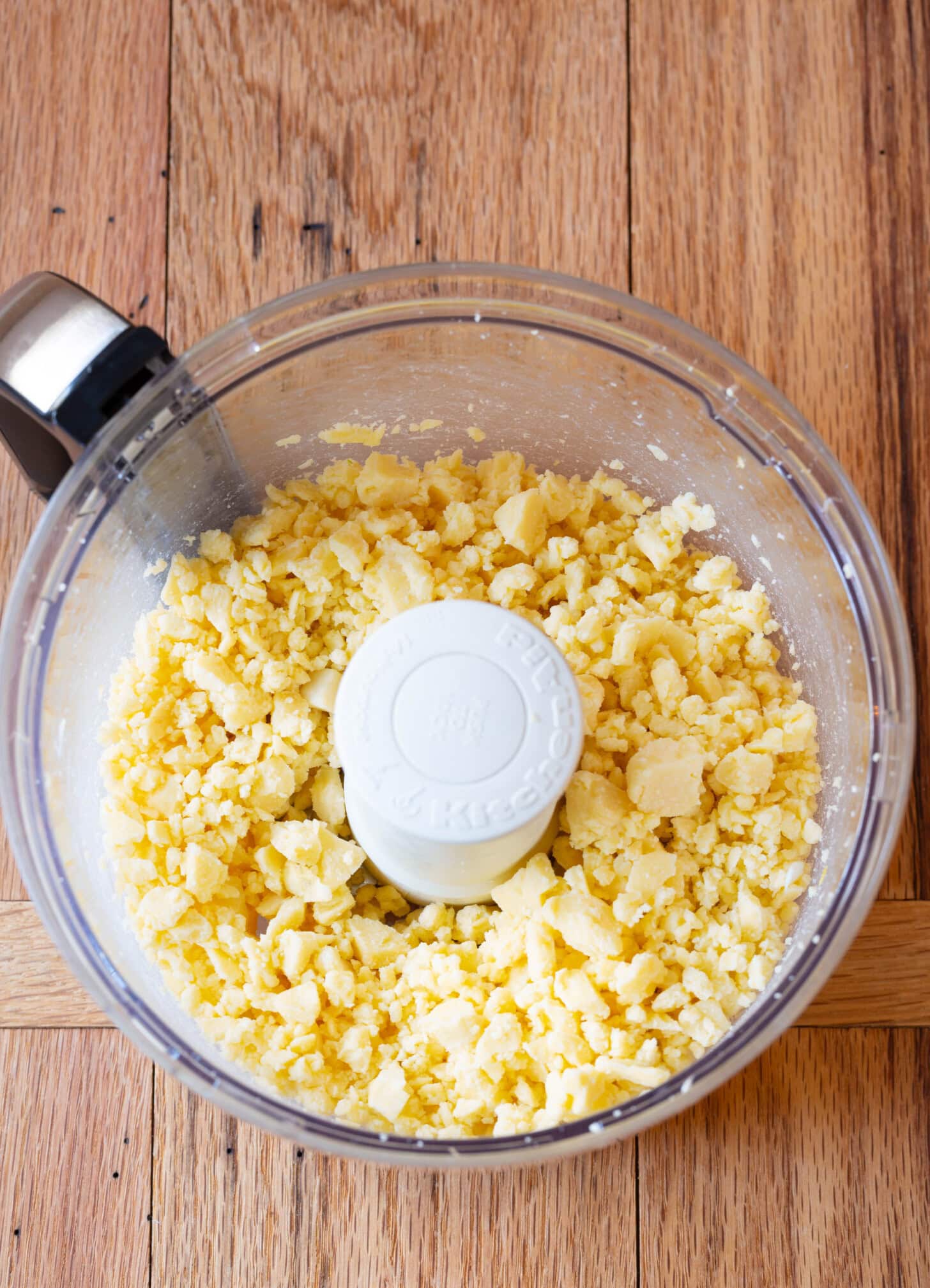 Small pieces of cheddar blended.