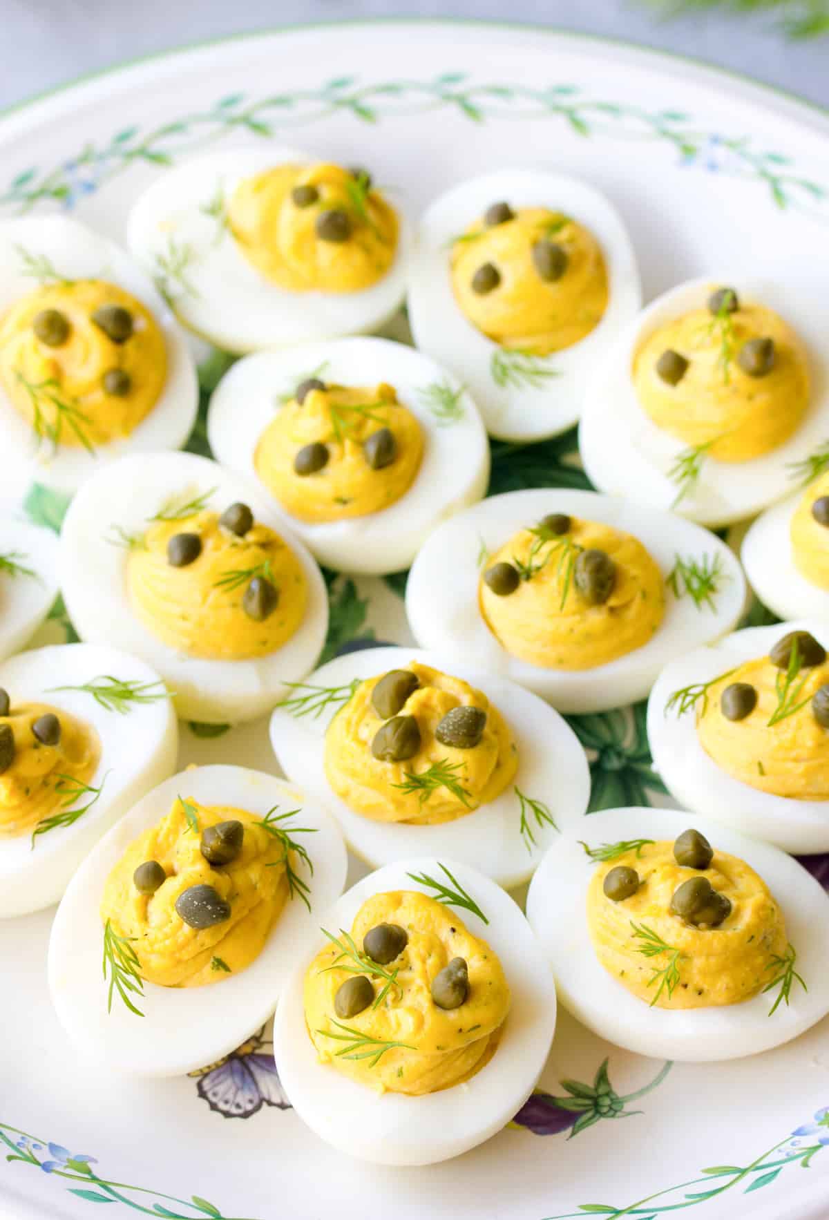 Classic Deviled Eggs Recipe with capers on a large platter