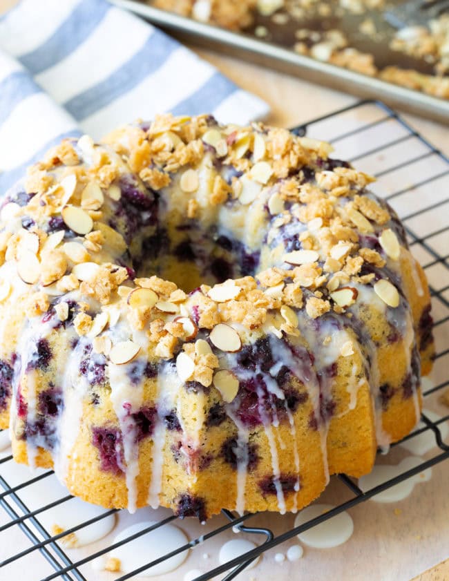 Blueberry cake topped with glaze and streusel topping. 