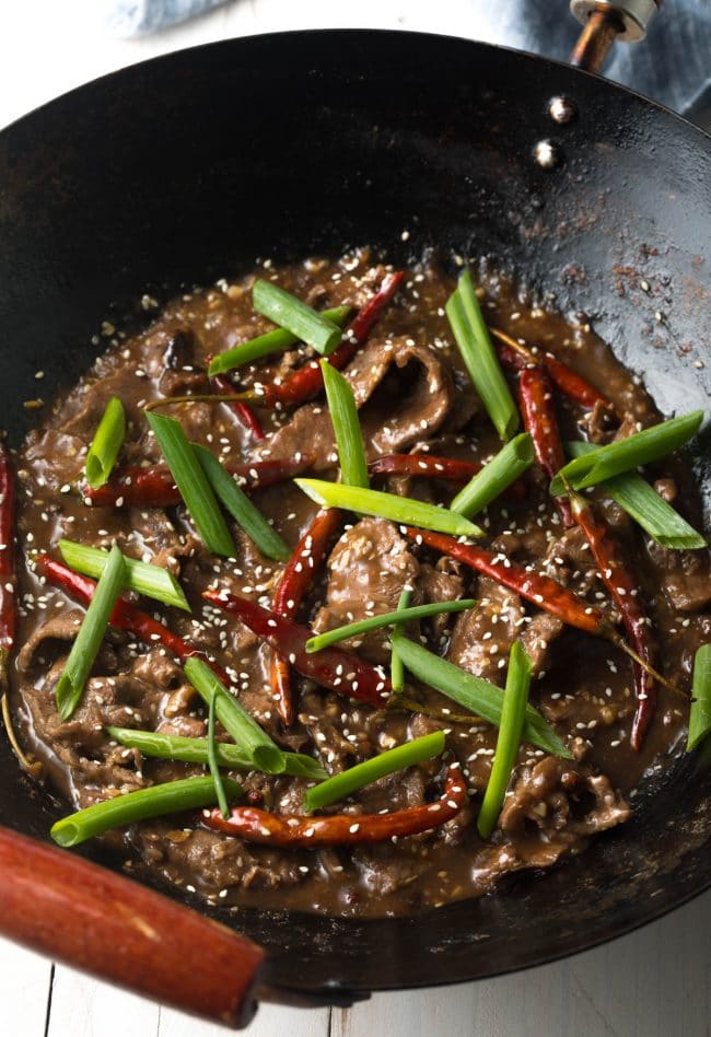 This spicy hot Szechuan Beef dish in a wok
