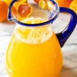 Orangeade Recipe in a large glass pitcher