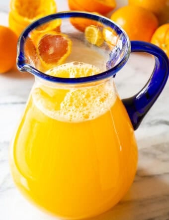 Orangeade Recipe in a large glass pitcher