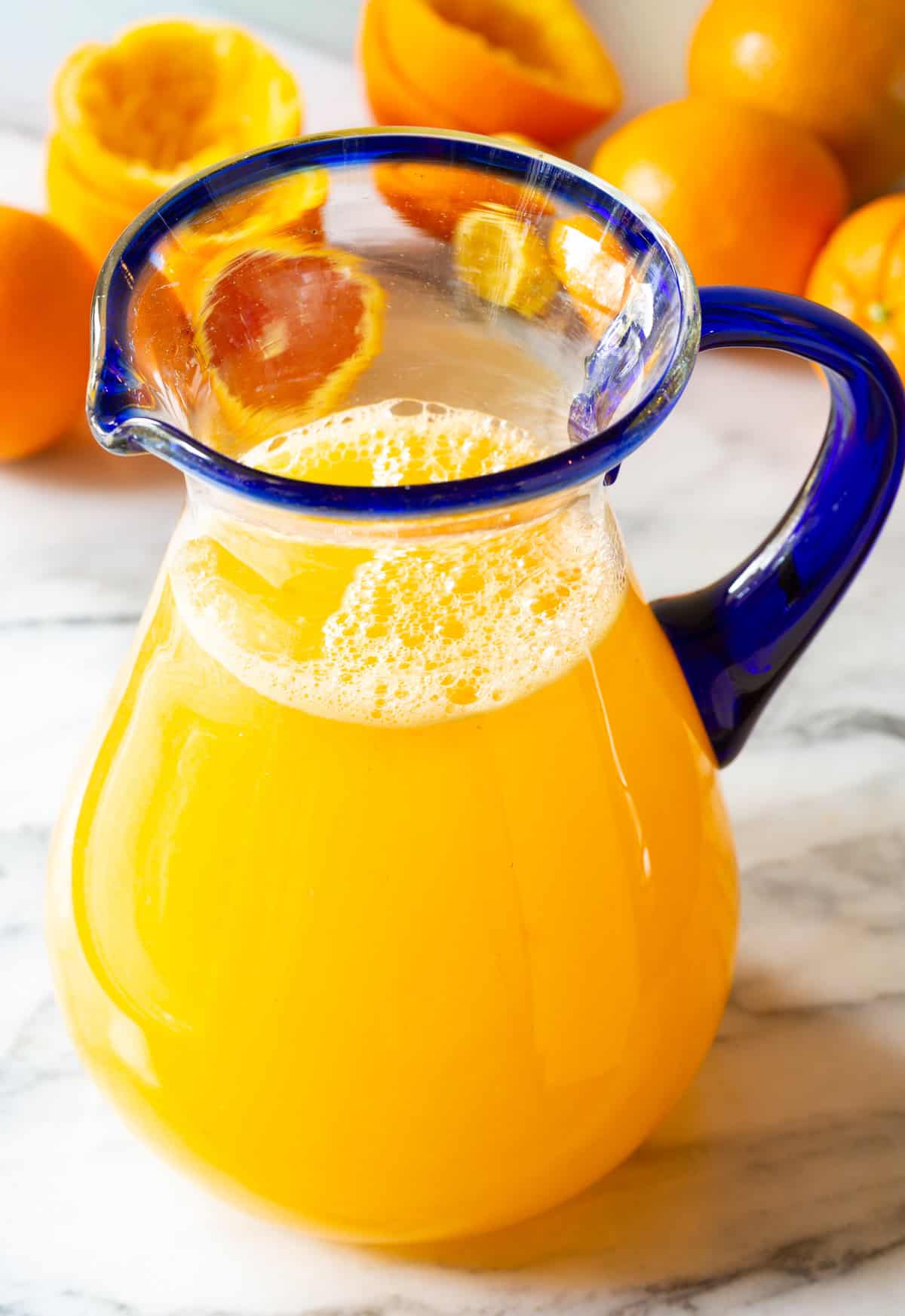 Orangeade Recipe in a large glass pitcher