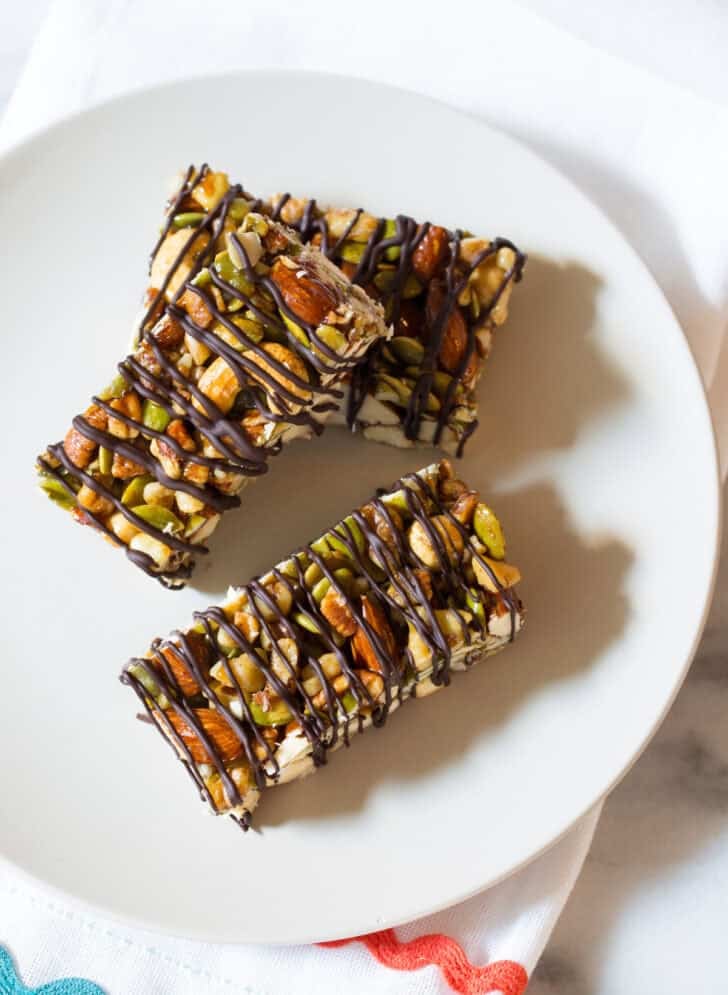 paleo nut bars with chocolate drizzle on top