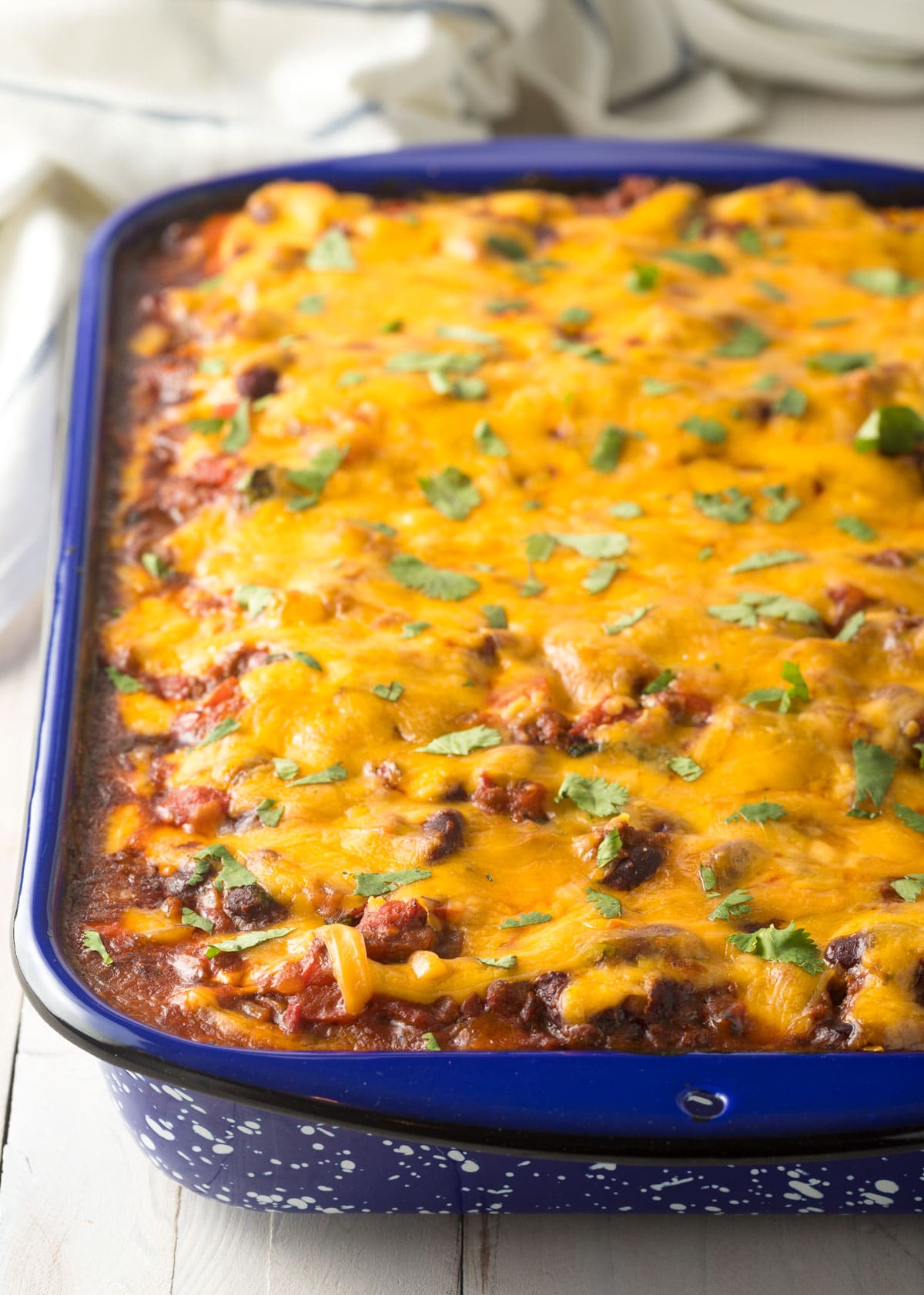 Cowboy Lasagna Recipe baked in pan with melted cheese on top