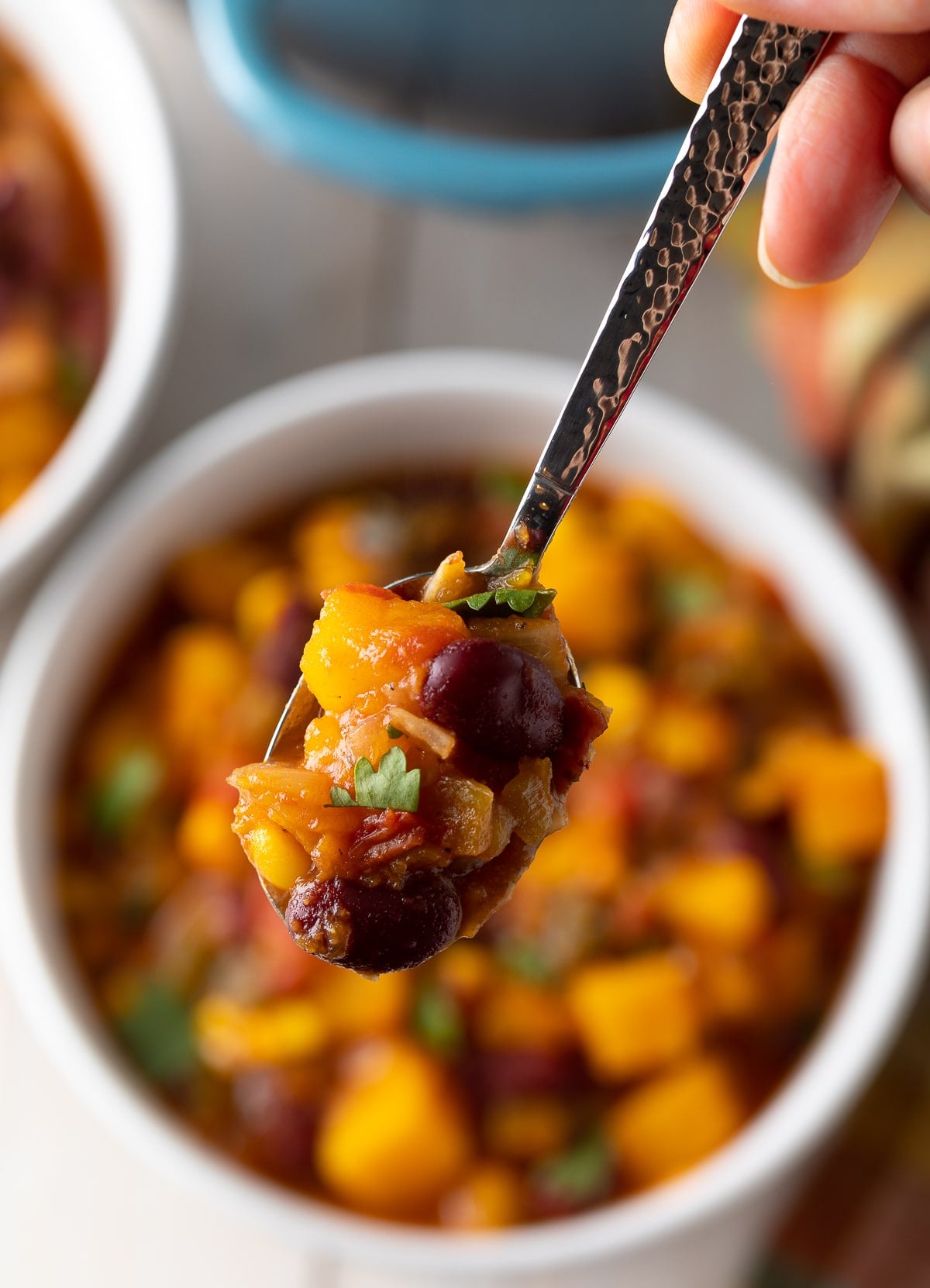 Bowl filled with squash chili.