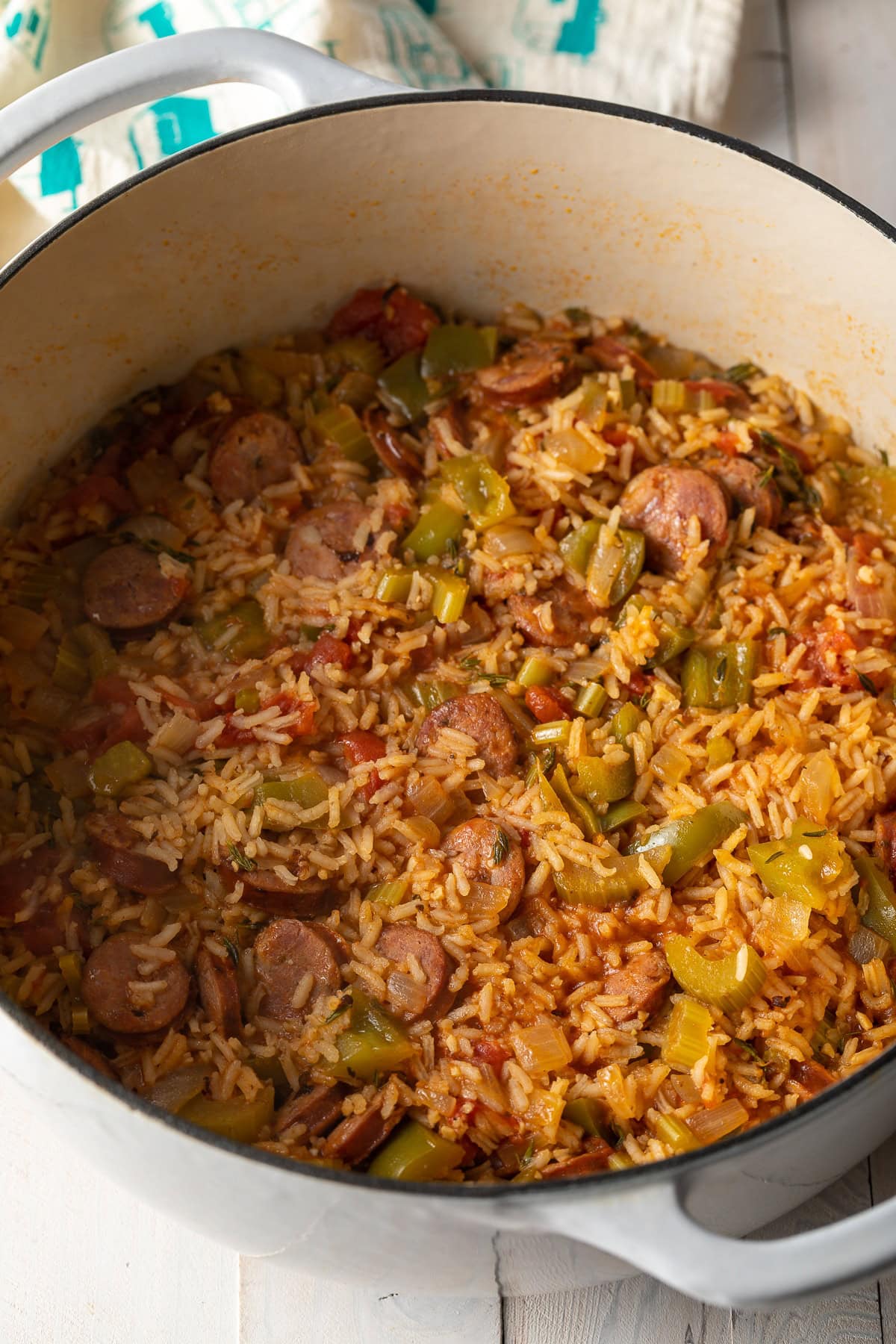 A pot of sausage jambalaya with rice added.