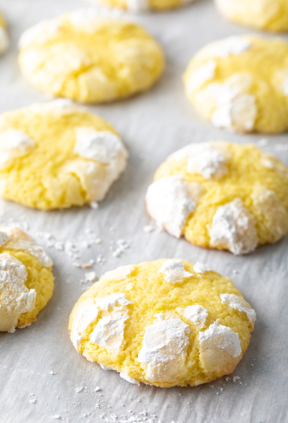 Closeup of baked lemon crinkle cookies.