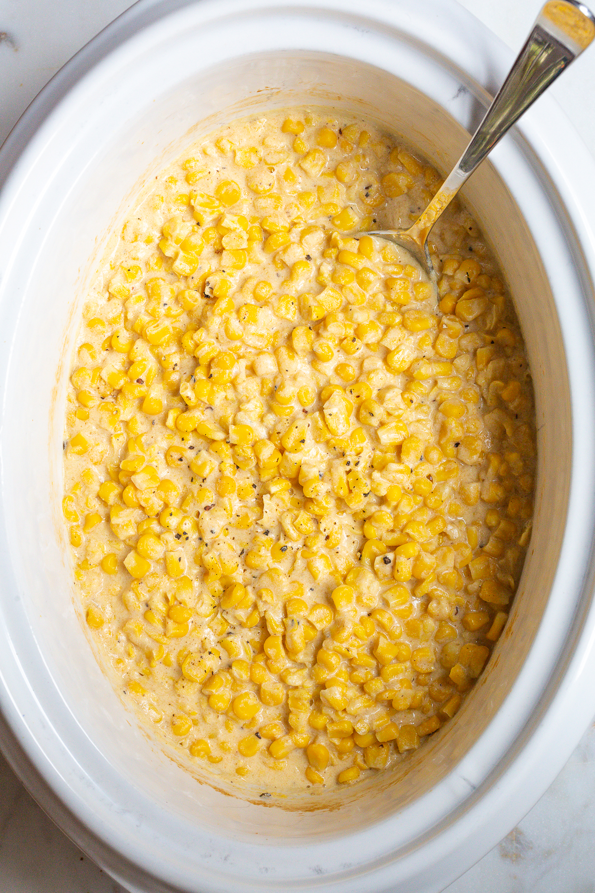 How To Make Creamed Corn  #ASpicyPerspective #corn #thanksgiving #holidays #southern #crockpot #slowcooker