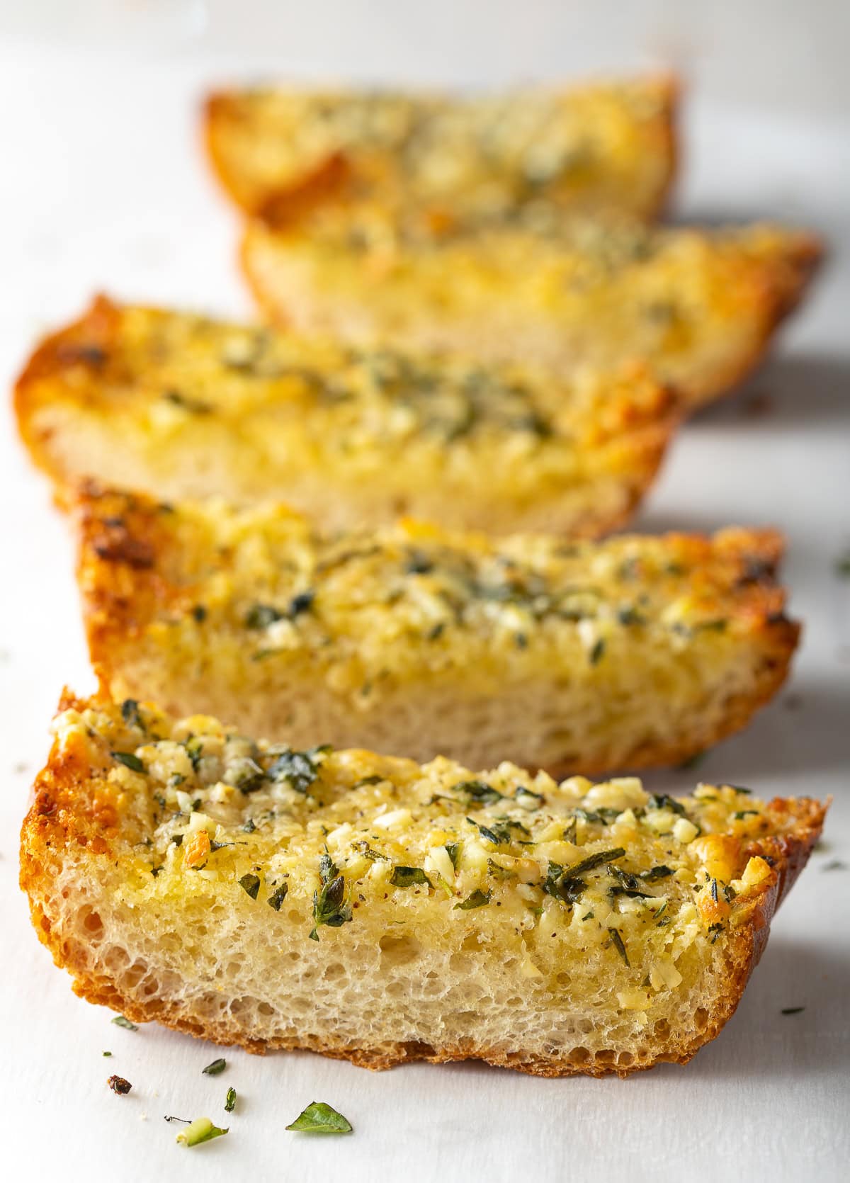 Close up of sliced garlic bread.